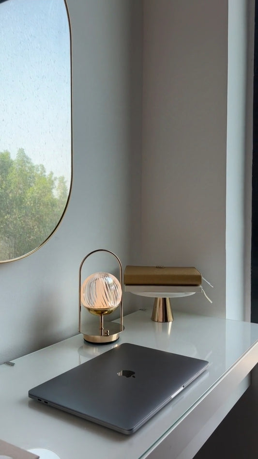 Closed MacBook on Vanity Desk