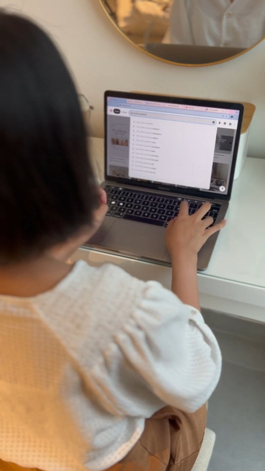 Woman Working From Home Searching on Laptop
